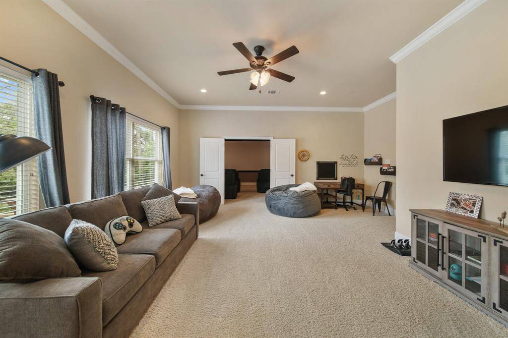 Enter the spacious open family room, an ideal setting for gatherings and everyday living.