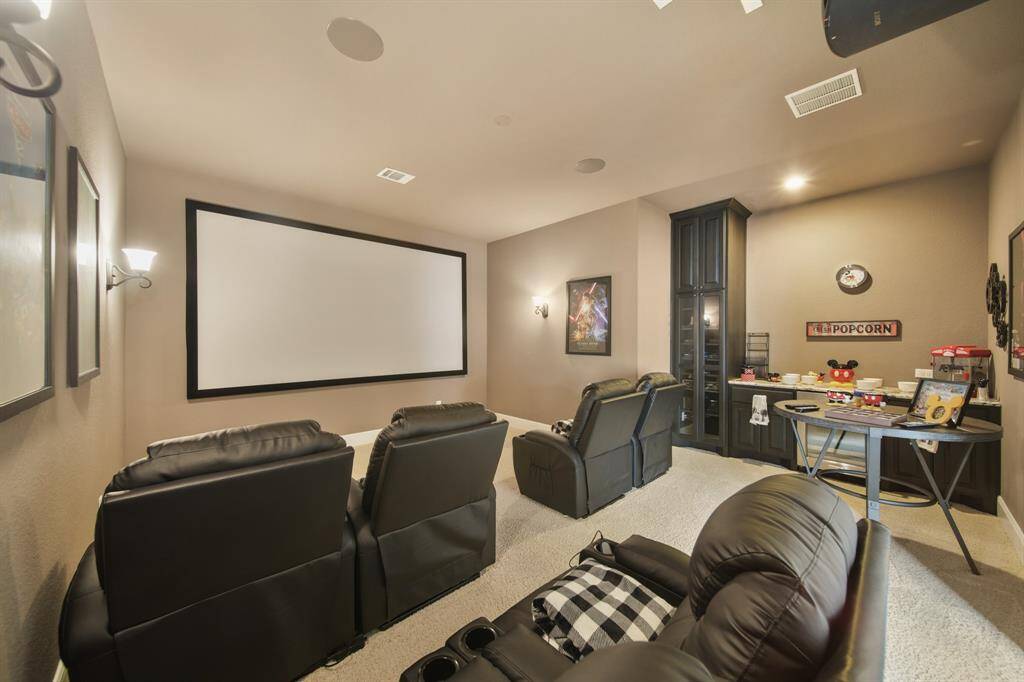 Enjoy the ultimate cinematic experience in the fully equipped media room, featuring a state of the art Sony 4K projector, immersive surround sound system and a massive 145-inch projection screen. Perfect for movie nights, gaming or watching your favorite sports, offering a true home theatre experience that will impress any guest.