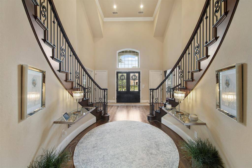 This impressive architectural feature leads to spacious living areas.