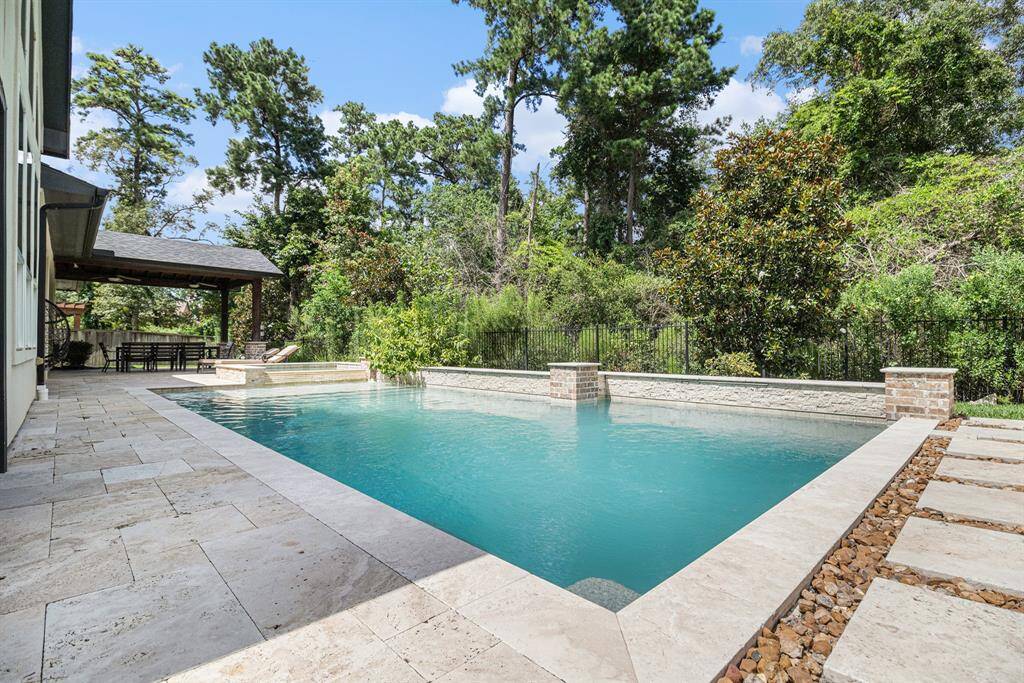 Enjoy the modern pool and spa, creating a luxurious and relaxing environment for both relaxation and social gatherings.