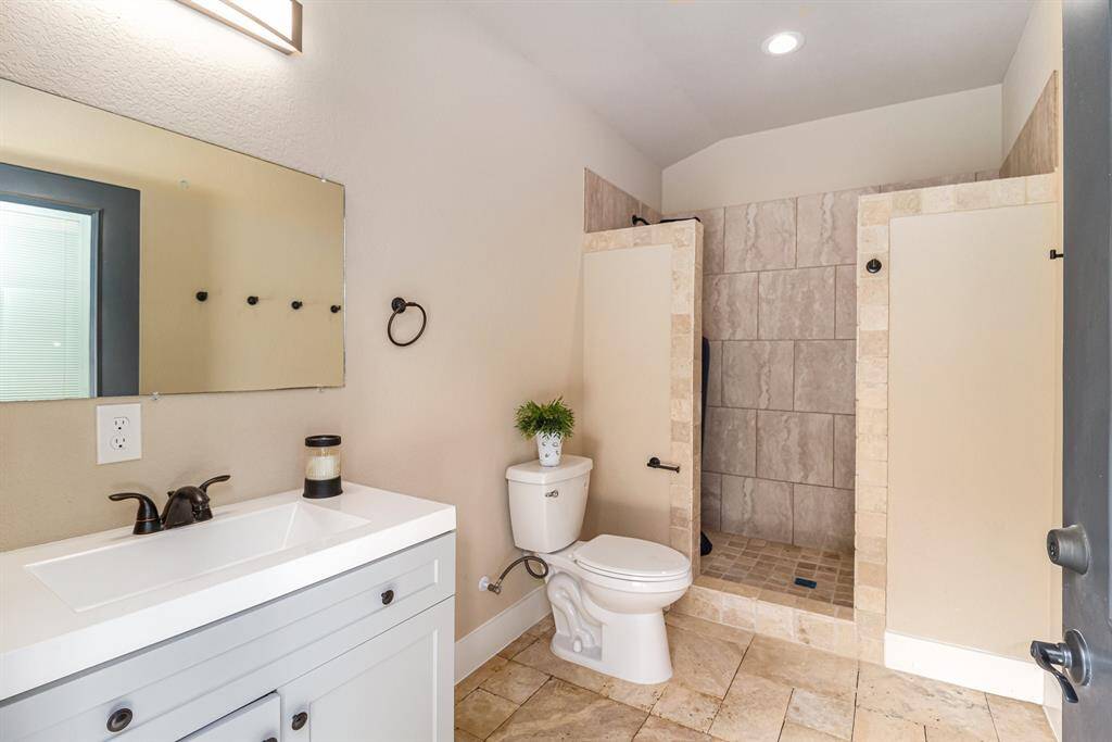 For additional convience, this full bathroom was recently added outdoors with direct access to the patio/pool area, enhancing functionality as well as comfort of your outdoor living space.