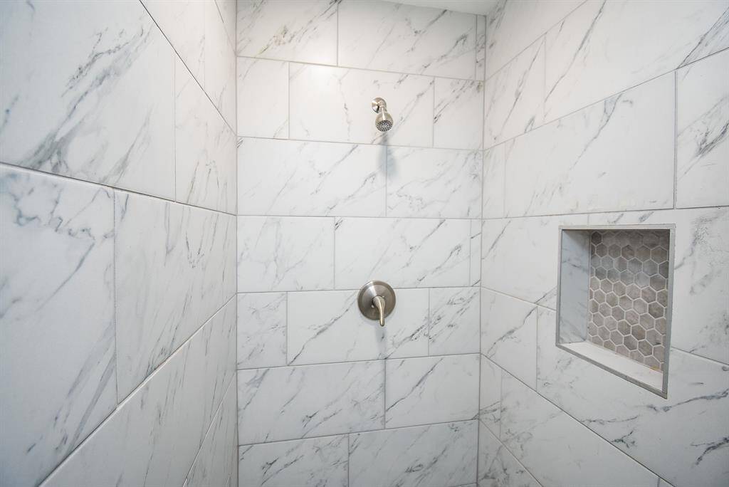 Enjoy a walk-in shower and thoughtfully designed hygiene nook.