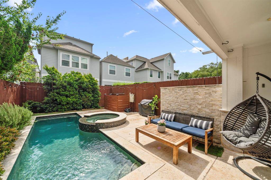 Heated pool and an amazing backyard space.