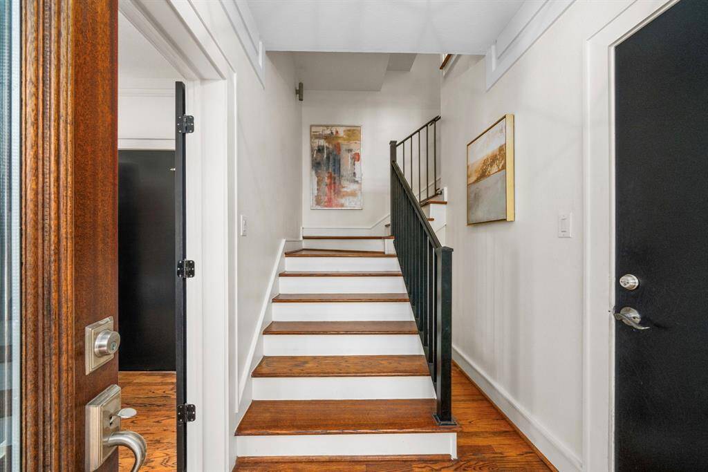 Upon entering, you'll notice a wide foyer with access to the 1st floor bedroom suite.
