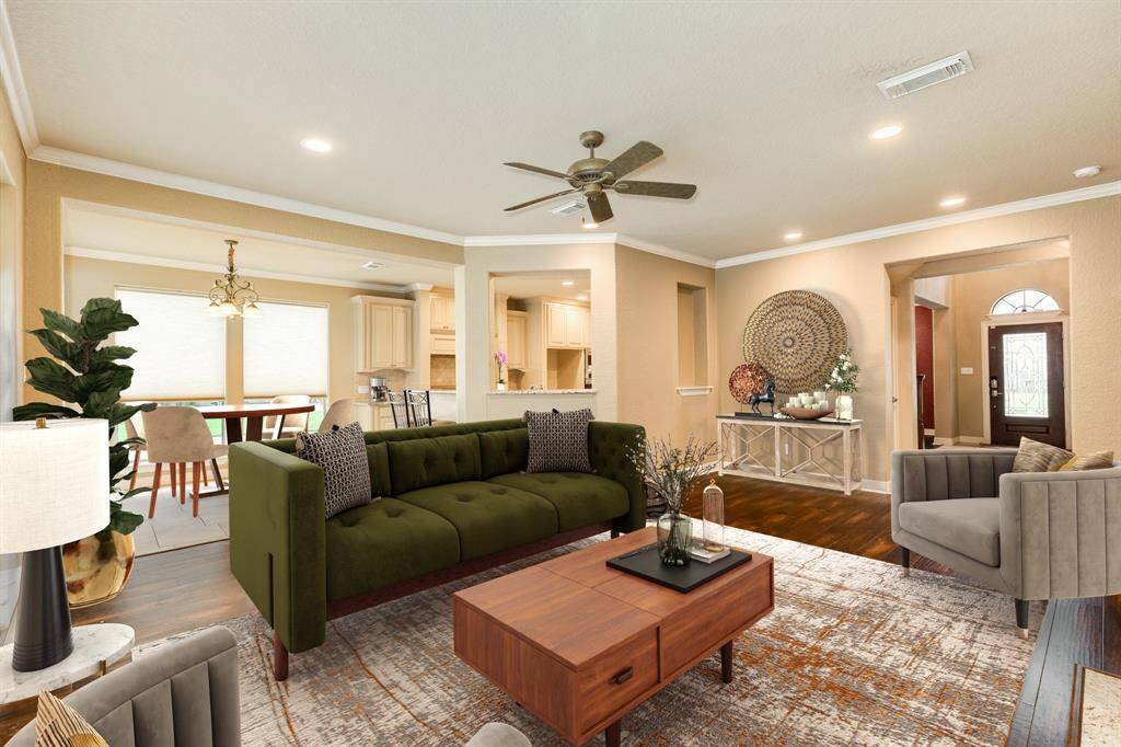 Another view of the living and dining nook. This space is opened to the family room creating the perfect place to kick back and relax or host the next gathering. This layout is perfect for blended use.