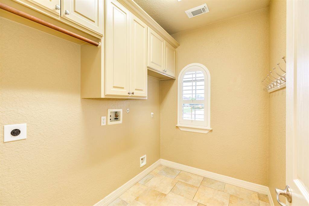 Large utility room downstairs. Enough room for washer, dryer, and a second refrigerator or deep freeze.