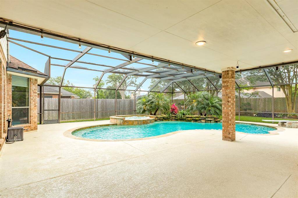 Cool decking laid all around to pool and covering the patio for added comfort. This feature allows the concrete to stay cool in even the hottest of summers.  Want out of the sun? No problem here. The extended covered patio offer plenty of space for furniture or lounger seating.