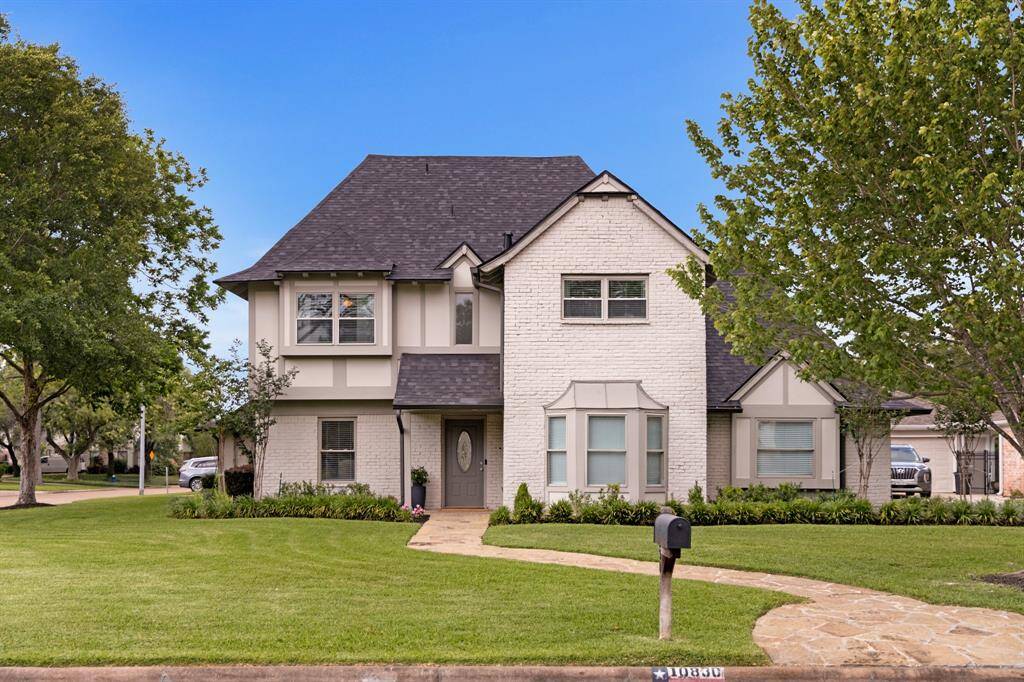 The exterior features grey painted brick complemented by new Hardie plank siding, giving the home a refreshed and durable finish. This combination enhances the classic look of the house while providing modern, low-maintenance protection