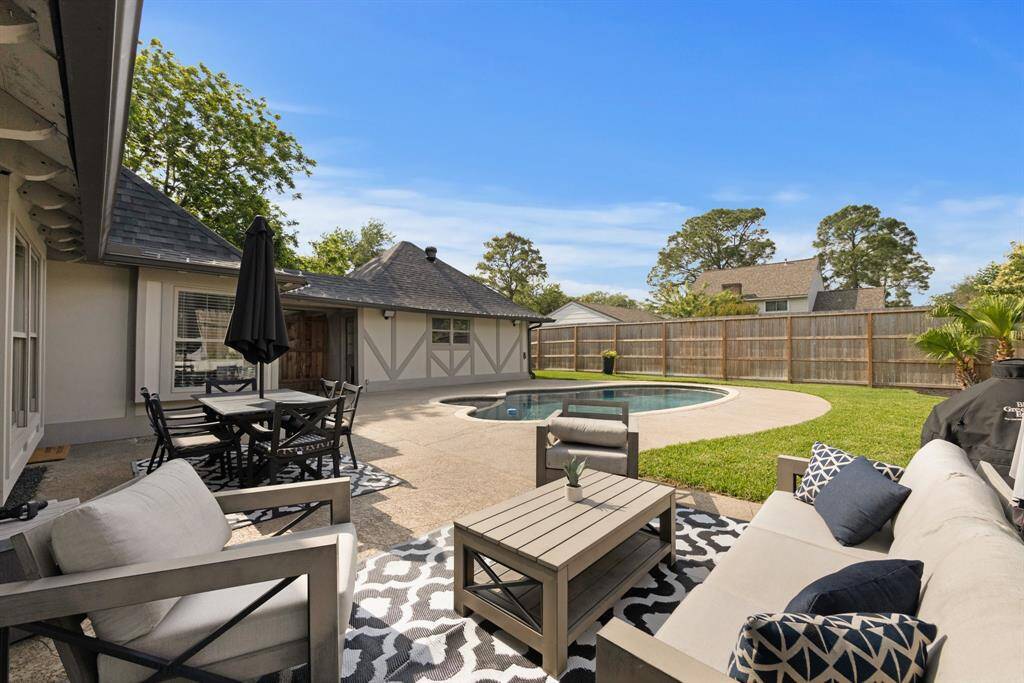 Step into your own backyard oasis of calmness. Sit in the yard to take in the greenery right next to the sparkling pool on those warm afternoons of summer.