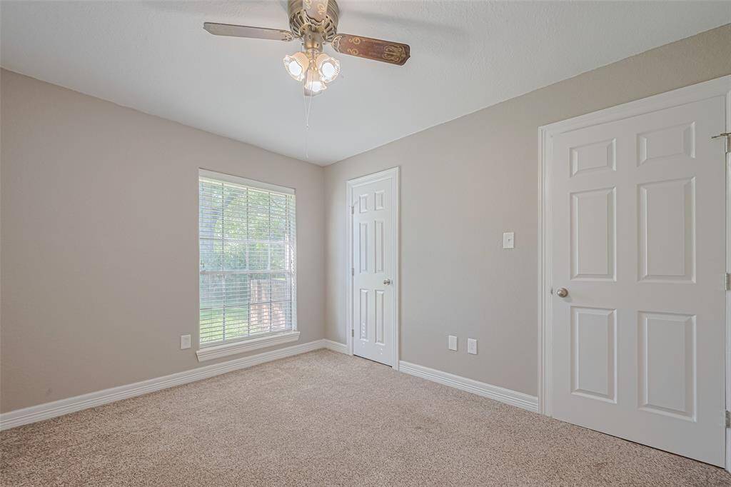 3rd bedroom offers lots of natural lighting from the large window, fan, and ample sized closet