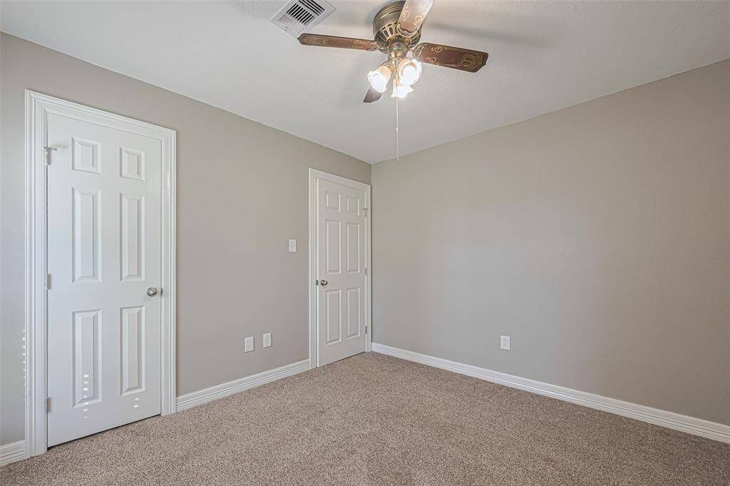 3rd bedroom offers lots of natural lighting from the large window, fan, and ample sized closet