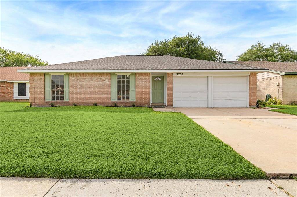 FRESH CURB APPEAL WITH NEW EXTERIOR PAINT AND A 30-YR TAMKO ROOF – MOVE-IN READY CHARMER WITH DOUBLE GARAGE AND CLEAN LINES.