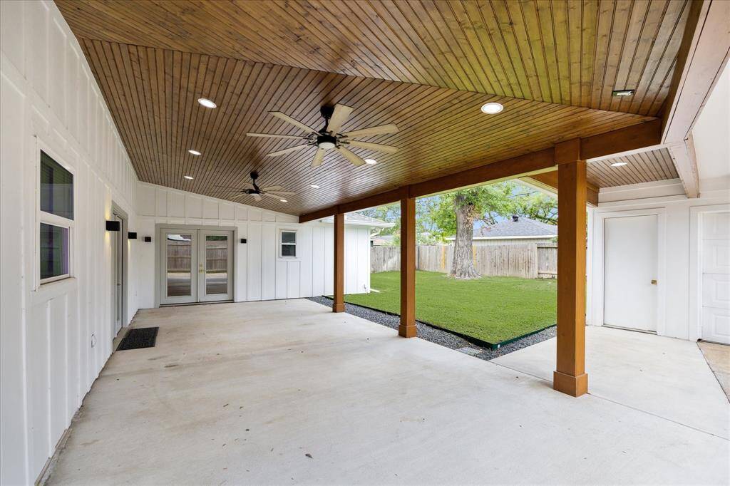 The covered patio provides a perfect retreat for staying cool on hot summer days