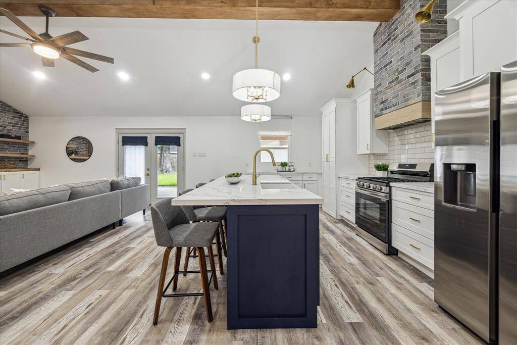 Open concept living at it' finest. All floors are Luxury vinyl plank for easy maintenance.