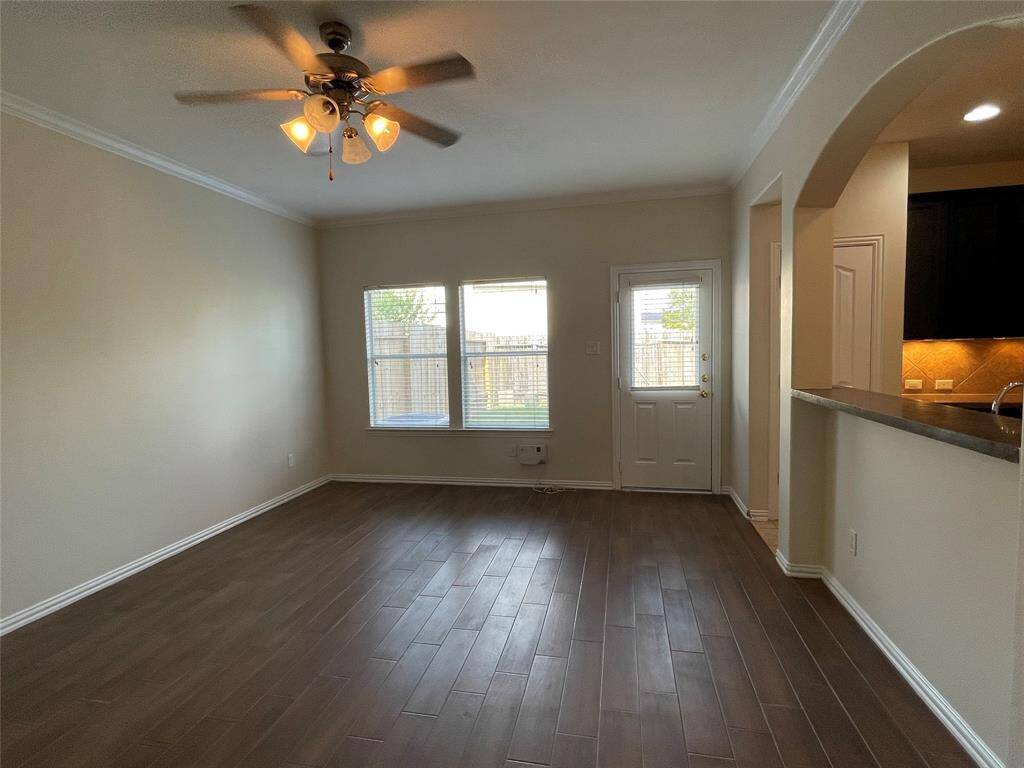 Living room; note large windows