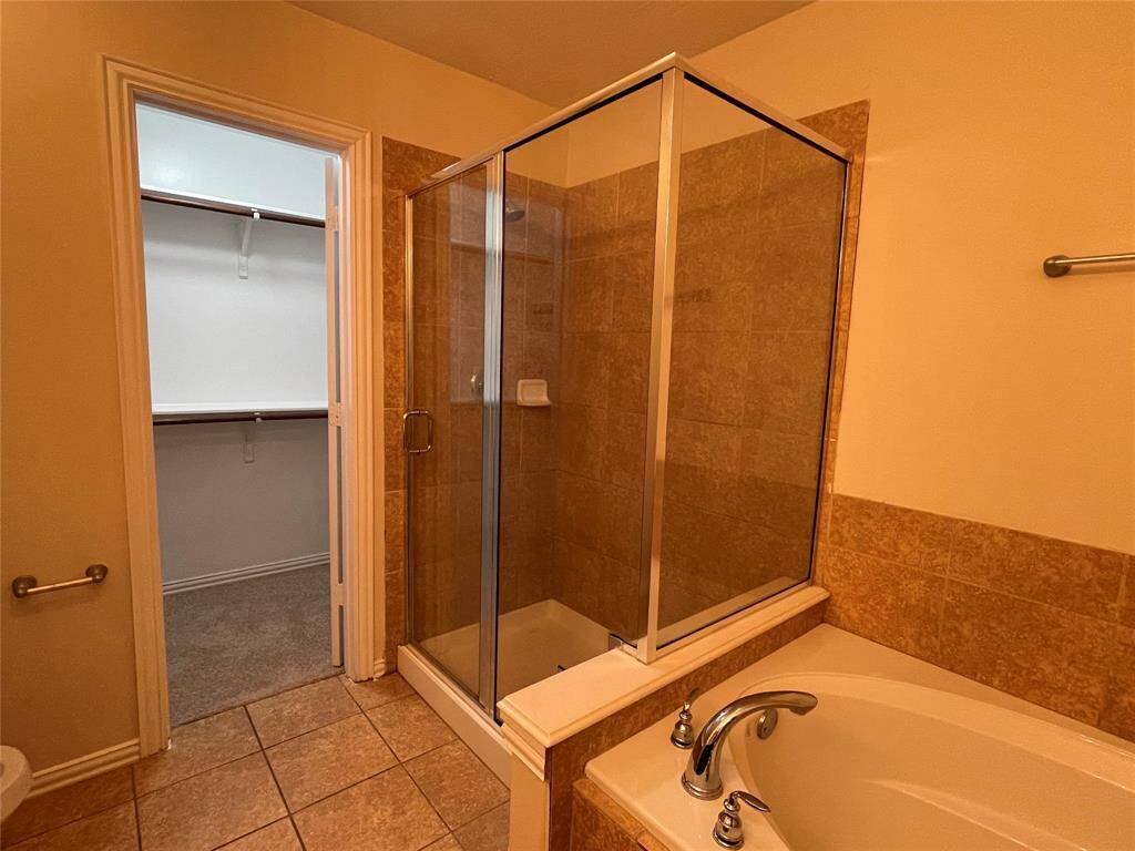 Primary suite bathroom, view of standing shower