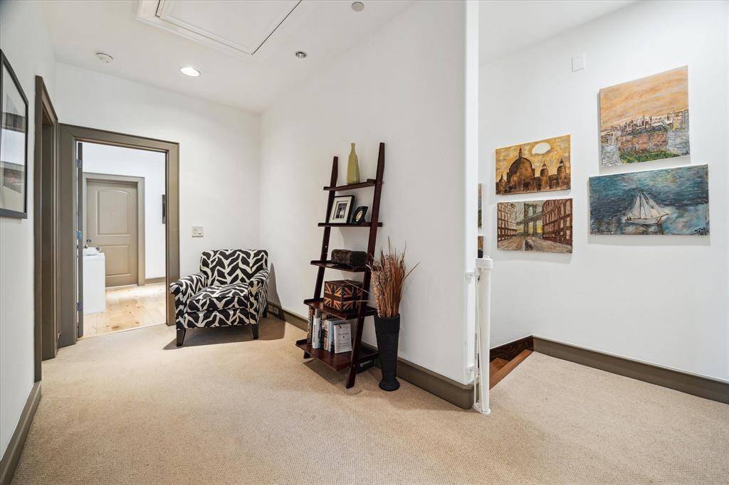 Upstairs landing leads to 3 secondary bedrooms and game room.