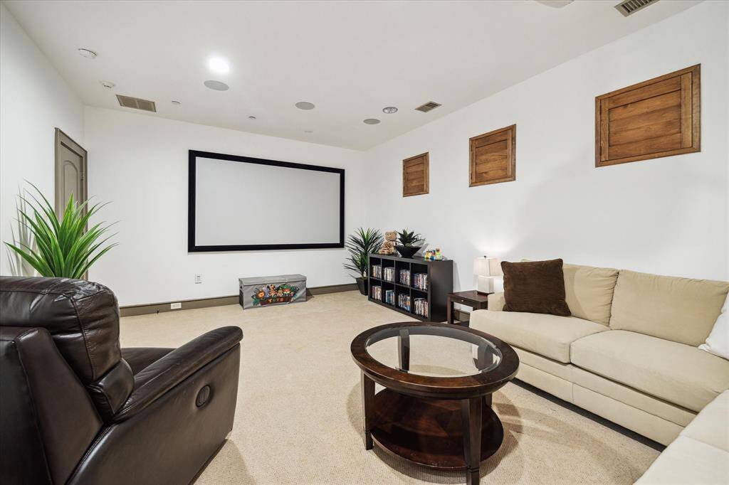 Game room/media room with custom shutters.