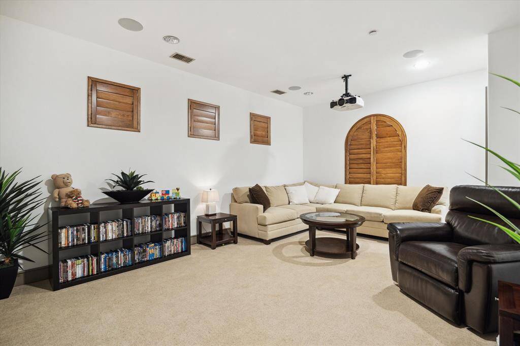 Game/Media room could be a 5th bedroom and opens to Hollywood bath.