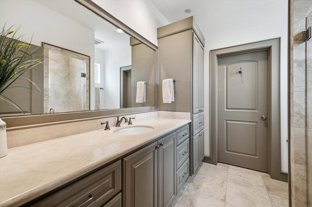 Third bedroom bath with walk-in shower, great built-in's...
