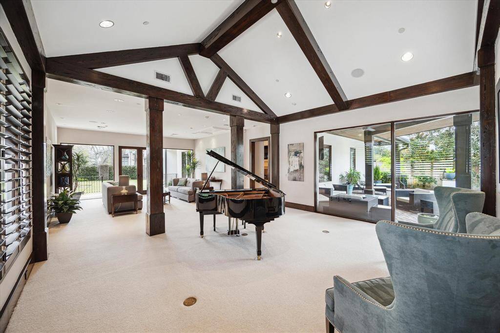 Stunning living spaces with flexibility for entertaining or casual living. Beamed ceilings, floor to ceiling windows and amazing light.