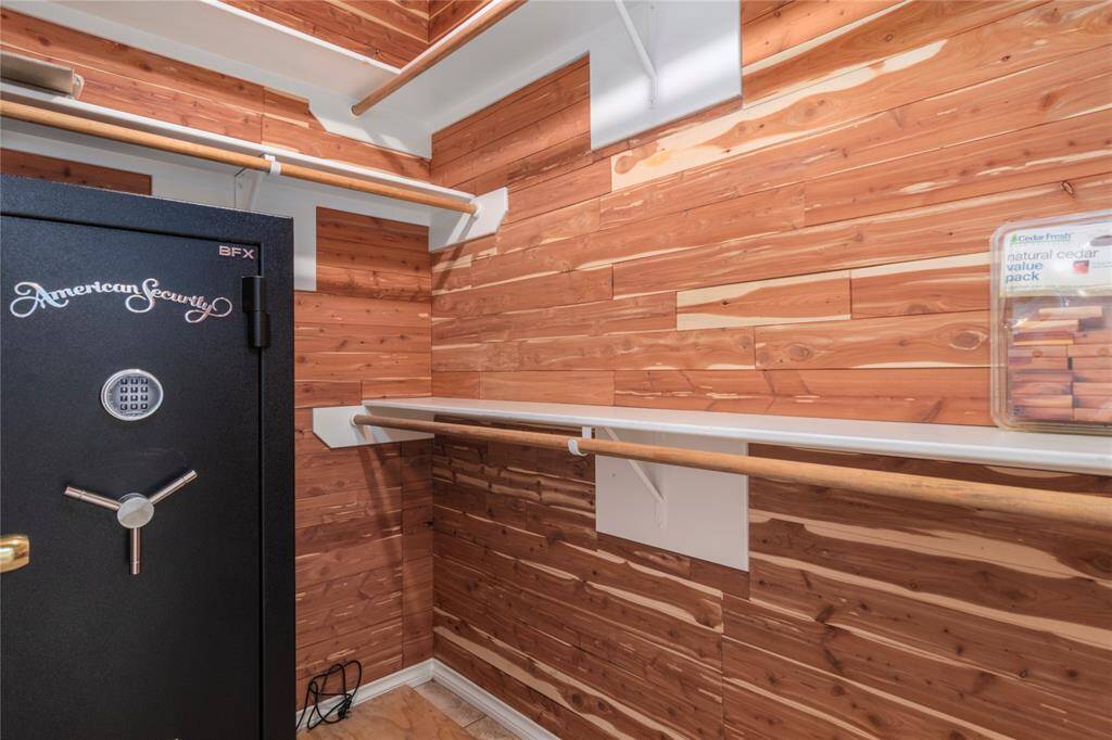 Master with walk in cedar closet.