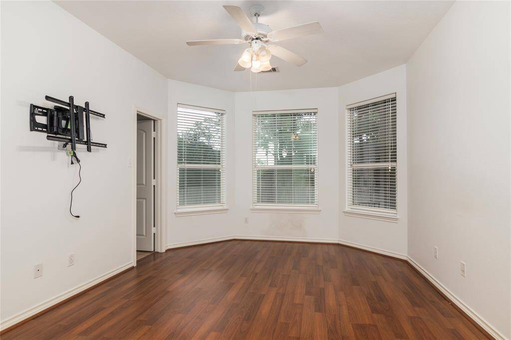 Second bedroom, bay windows and a great closet.