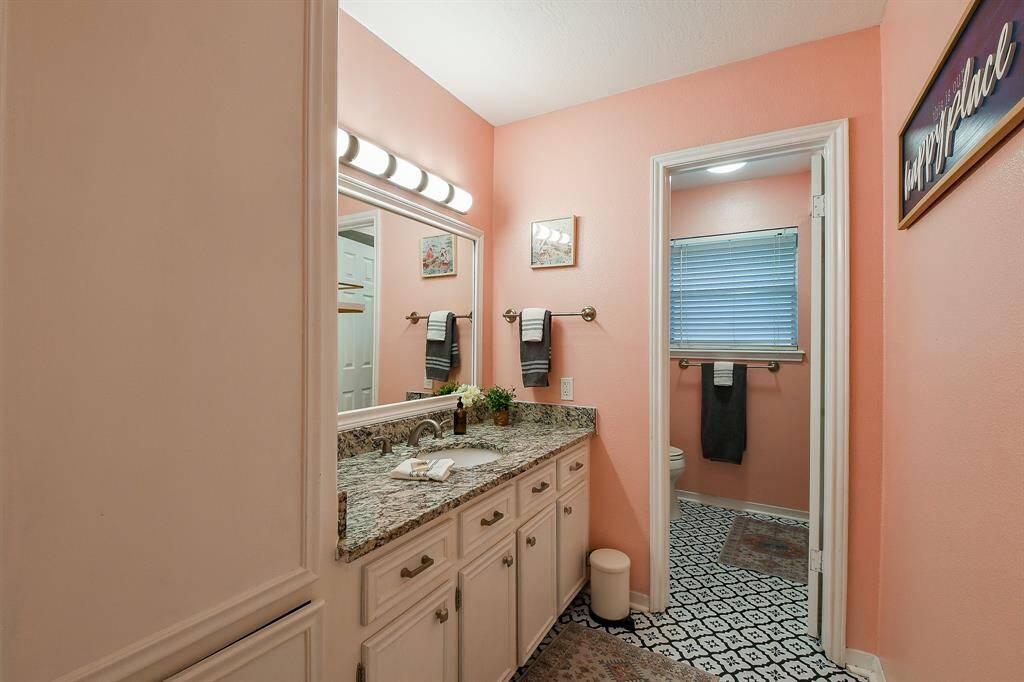 Second bath with lots of storage space and linen closet with tub/shower combo