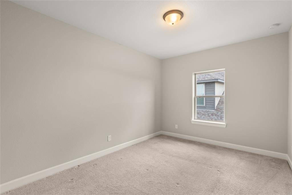 Bright bedroom window and neutral tones
