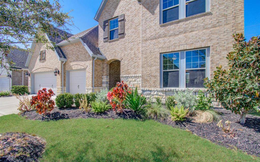 Manicured lawn with contemporary landscape