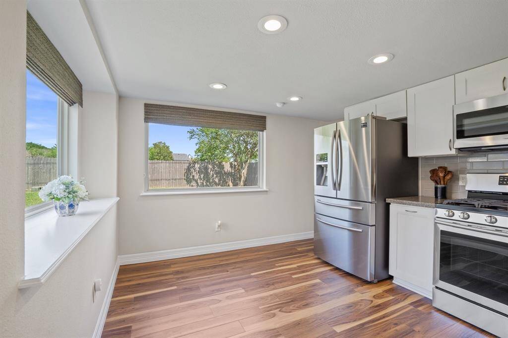 This space could accommodate a portable island or smaller 4 person round table if you are wanting a more casual eating area.