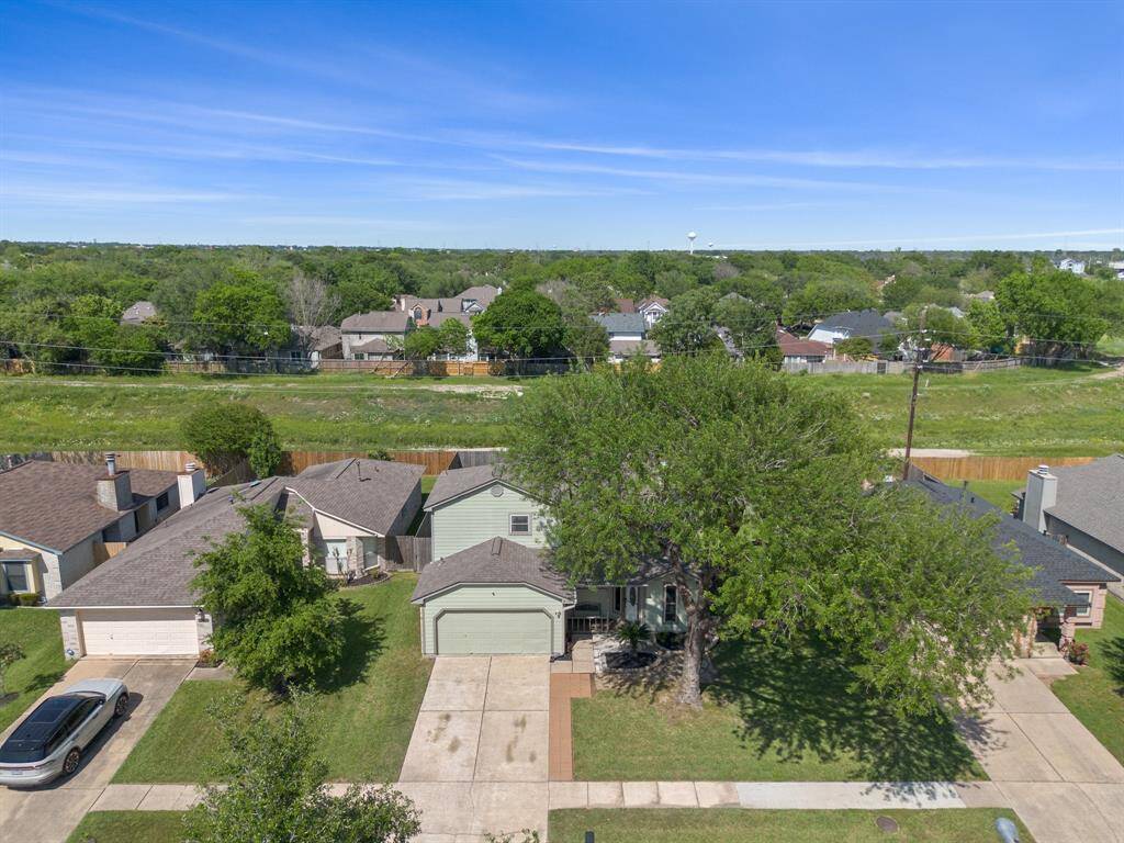 Ariel view of the front of the home.  Notice the green space behind the home with no nearby backdoor neighbors.