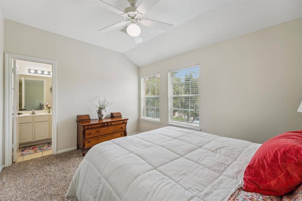 Bedroom #5 with a walk in closet & an en-suite bathroom. Could be utilized as a 2nd primary bedroom.