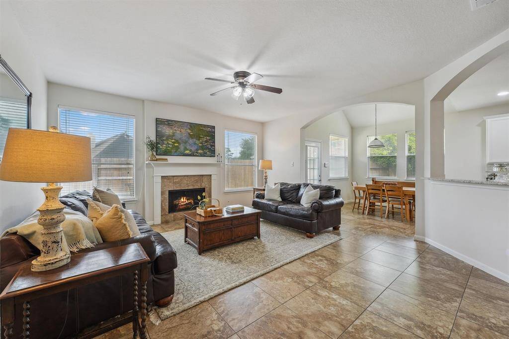 Living room open to the kitchen and breakfast area.