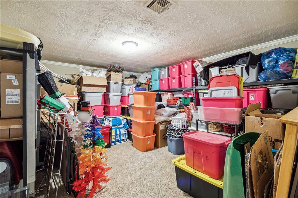 This spacious bonus room offers incredible flexibility—use it as a game room, craft room, home gym, or personalized flex space to suit your lifestyle. Currently utilized as walk-in attic storage, it’s ready to be transformed into whatever you imagine!