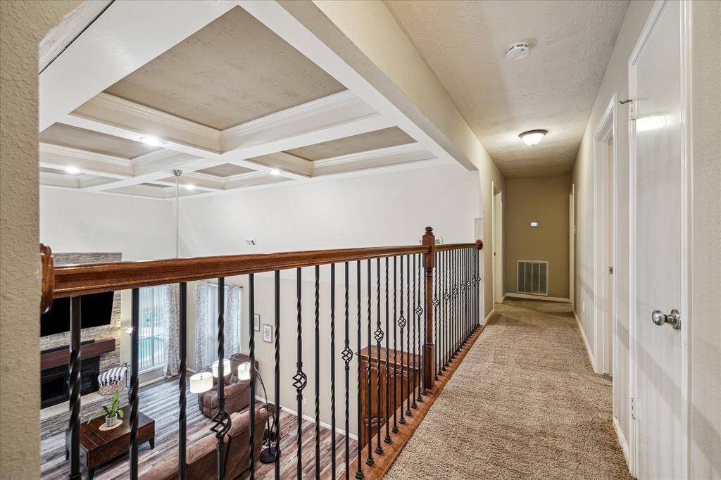 Catwalk leading to the upstairs secondary bedrooms.