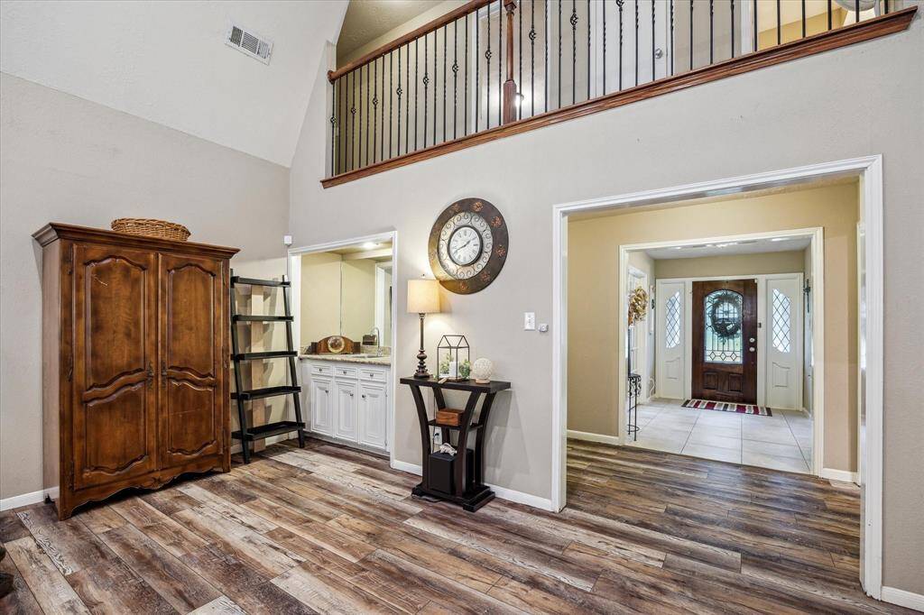 Charming built-in wet bar, perfect for converting into a cozy coffee or tea nook.