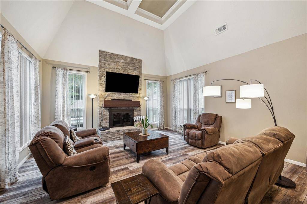 Bright and open living space with vaulted ceilings.