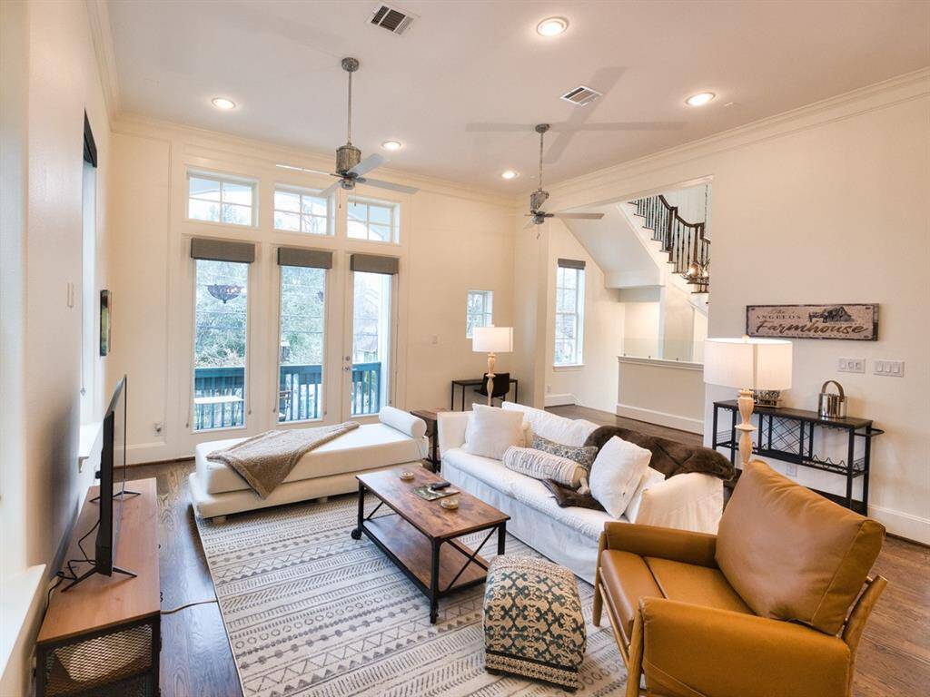 Reverse view of the living room - see how the balcony can be an extension of the living area and the doors allow for so much natural light!