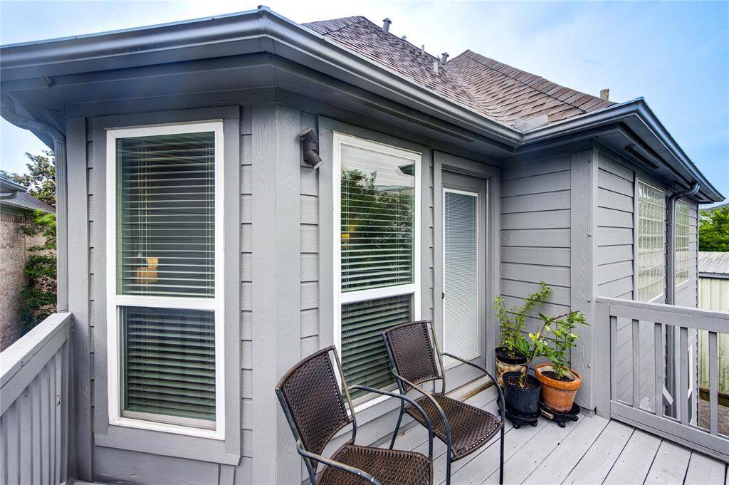 The private third-floor balcony off the primary bedroom offers a peaceful retreat with panoramic views of the surrounding area. Perfect for enjoying morning coffee, evening sunsets, or quiet moments of relaxation, this private outdoor space is an extension of the primary suite, providing both comfort and tranquility.