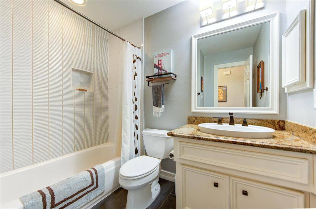 Each full bathroom offers granite countertops, upgraded fixtures, and tub/shower combos with tile surrounds—delivering both style and comfort.