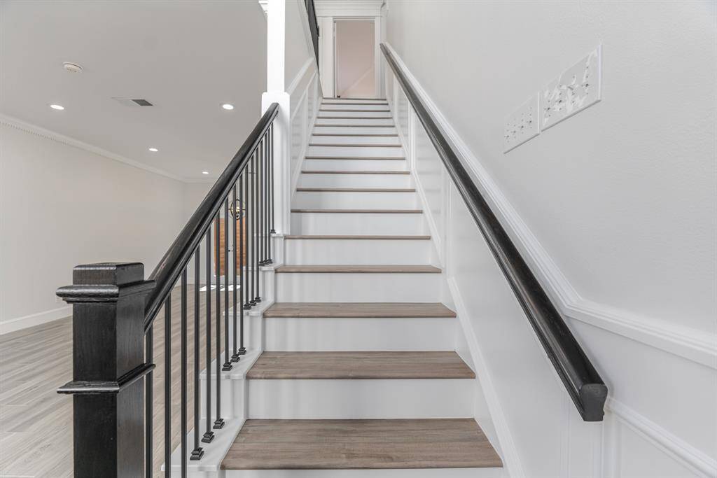 Let's Head Upstairs. Completely Remodeled Ballesters and Flooring.