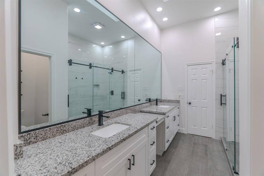 Luxurious Primary Suite: Spa-like Bathroom And Two Large Walk-in Closets For Ultimate Comfort.