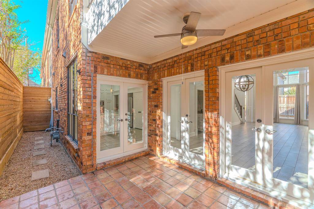 Outdoor Living Potential: Backyard Or Patio Areas Ready For Personal Touches.