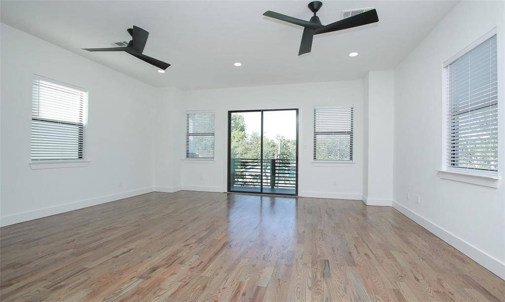 View from the second story sliding glass towards showcasing ample storage and flexible use.