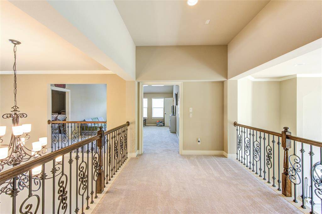 Upstairs landing can accommodate a shuffle board, air hockey or can be a great reading nook. This landing overlooking the living room is 13 feet by 10 feet.