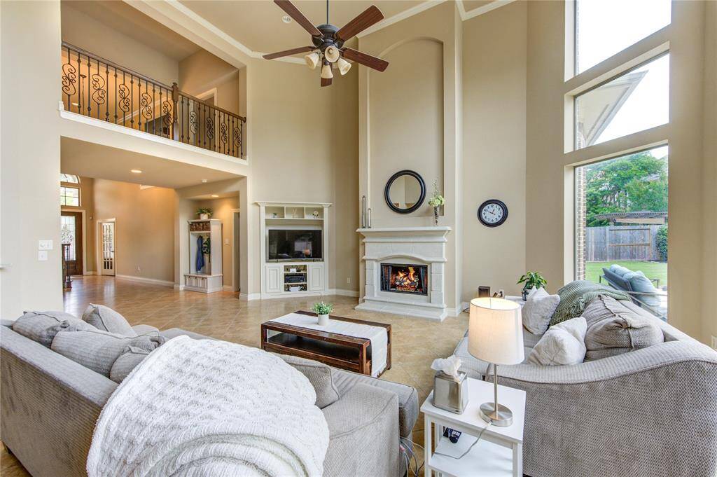 Open concept living room with tons of natural light. The front door faces north.
