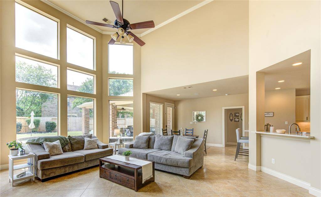 Inviting and welcoming Open concept living room with an abundant of natural light. The front door faces north