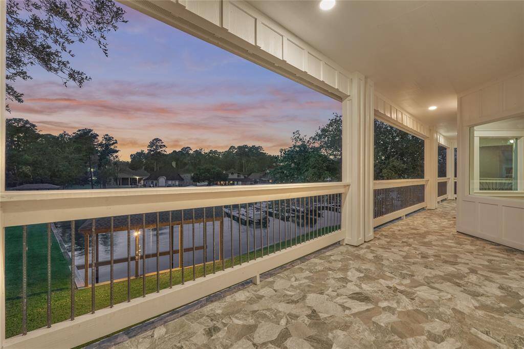 Balcony overlooking the lake connects bedrooms 2 and 3.