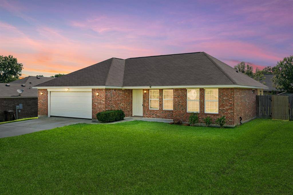 Welcome to 12608 Ridgecrest Drive—a charming single-story home nestled in the tranquil Lake Conroe Hills community.